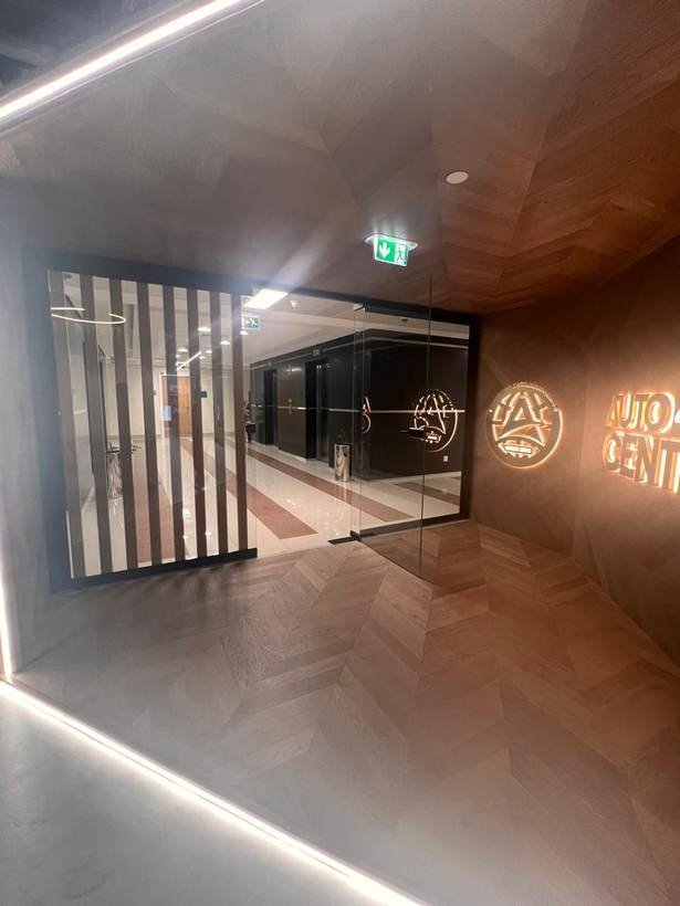 Arivir office corridor with backlit signage